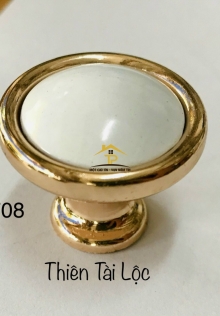 Tay nắm tủ gù vàng trắng 7708
